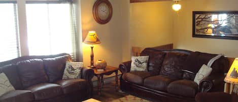 The living room has comfortable seating for relaxing and enjoying time together.