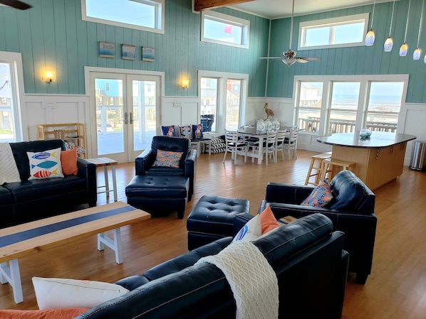 Wide open concept living space.  13ft ceilings with natural light throughout.