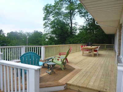 View of the lake from 2 decks in this 6BR Lake Shore Dr home, steps to the beach