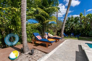 Ultra Luxury Lounge Beds + Private Tropical Backyard 
