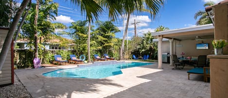 Large Heated Salt Water Pool + Private Tropical Backyard + High End Lounge Beds