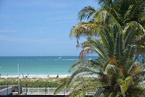 Watch the boats go by sitting on the balcony. 