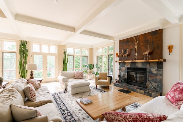 Gather together:Enjoy a wood fire in the comfy furniture of the living room