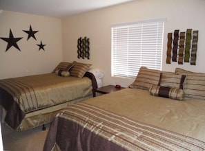 Two comfortable queen sized beds with large walk in closet.