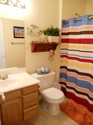 This bathroom is located right off the master suite, the shower has 2 seats.