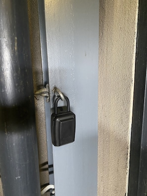 Lock box to left of entry door.