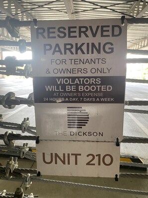 Sign at parking space.