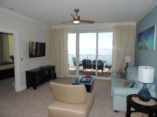 Spacious living room; full size sofa bed, ceiling fan, flat screen TV & DVD. 