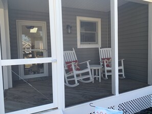 Enjoy time on the front screened porch