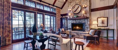 Open Plan Living Room with Soaring Ceilings and Gas Starter Wood Fireplace