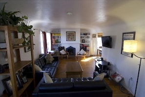 Comfy, cozy living room.  Gas fireplace, coved ceilings.  Kick back and relax.