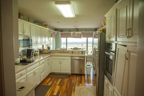 Ample space for cooking while enjoying the serene view of the mountains.
