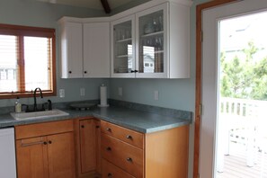 Kitchen with door to upper deck