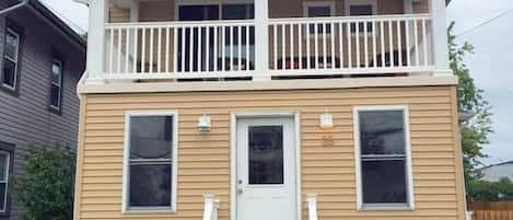 Front of House -view of deck. 2nd-3rd flr unit gets 2 off-street, driveway spots