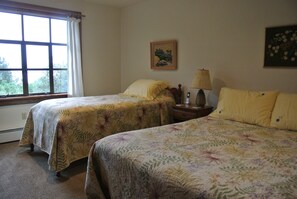Downstairs bedroom with (1) twin and (1) queen