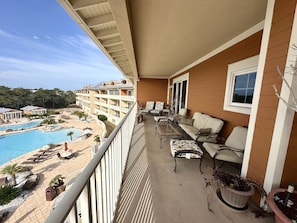 Largest top floor balcony in the entire condo, right above all the pools