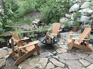 Outdoor Slate Patio with a large fire pit