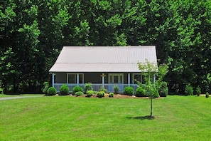 SIT ON THE FRONT PORCH AND ENJOY THE VIEW & FLAT YARD TO PLAY