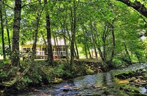 SIT ON COVERED BACK PORCH AND ENJOY THE CREEK