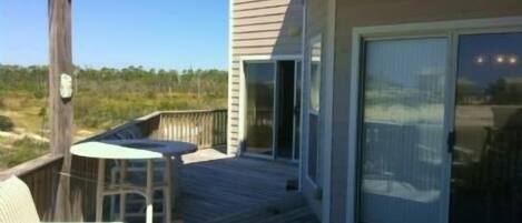 Large covered, private deck below to relax, listen to the waves or take a nap. 