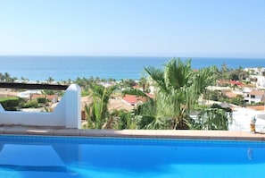 View of the Pacific Ocean from the pool. Watch the whales.