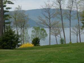 View of Newfound Lake and Cardigan Mtn. from the home's deck.  Beautiful sunsets