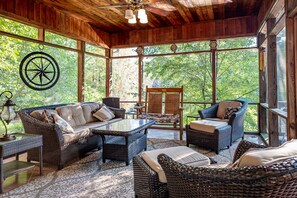 Screened in porch off great room, next to grill, awesome lake views.

