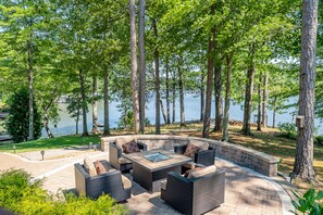 Sunset patio now w 6 chairs, fire insert, water views on 3 sides of peninsula