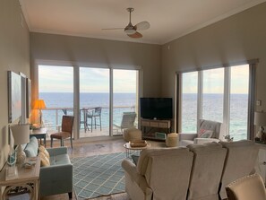 Watch TV or watch pelicans and paragliders sail by the floor-to-ceiling windows.