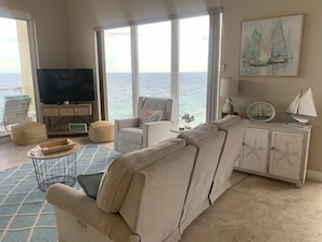 The sofa has 2 electric recliners and charging ports for phones.