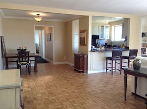 The apartment has newly refinished hardwood floors.