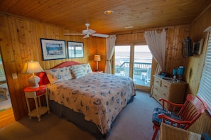 Captain Quarters.  South King Bedroom.  Ceiling Fan,  Sliding door to deck.