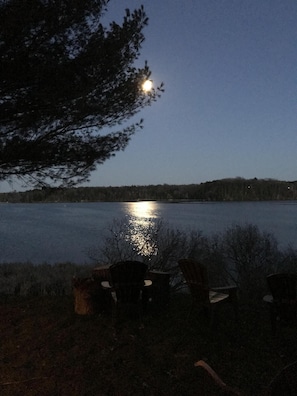 watch the moon over the lake as you sit on the deck.