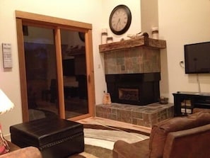 Family Room with Slate Fireplace & Barn Beam Mantle