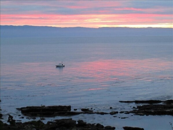 Rise early to see a spectacular sunrise - taken in front of Sea Shell