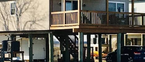 Front of house faces Beach.  Back faces Wildlife Refuge. Two decks/ Parking