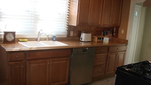 Looking into the kitchen from the living room entrance.