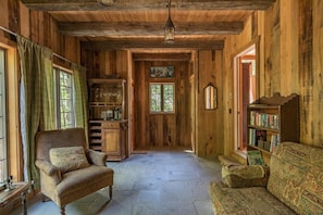 lounge and lose yourself in wood and stone .