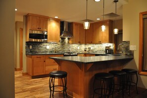 Well appointed kitchen with granite and SS appliances 