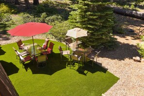 Outdoor lounge from upper deck~ New synlawn grass area 