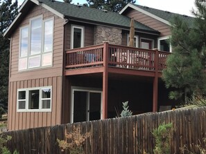 Two story home with deck. Double sided fireplace