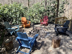 Fire pit area overlooking rushing creek