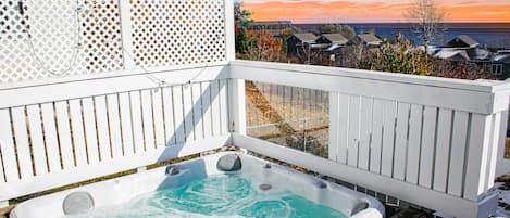 Hot tub has 180° view of Lake Superior and is available all year