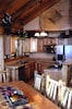 One of three full sized, fully furnished kitchens