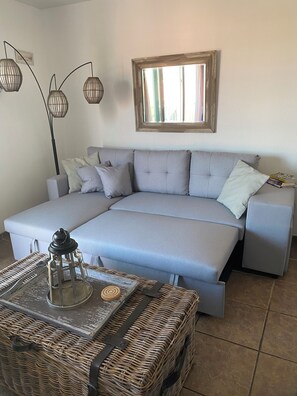 Couch pulled out for bed or just lounging.
