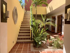 Stairs leading upstairs to the master bedroom, barbecue and the viewing tower.
