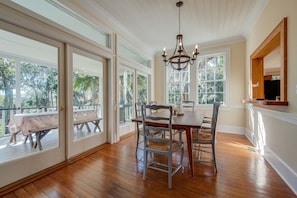 Dining area with wooded & marsh views