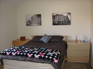 Second floor master suite with queen bed and ensuite bathroom