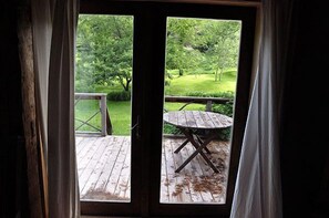 Out the french doors onto the back deck and lawns - perfect for summer meals