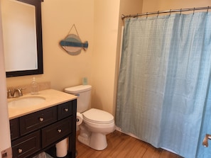 Upstairs bathroom next to bedroom. 